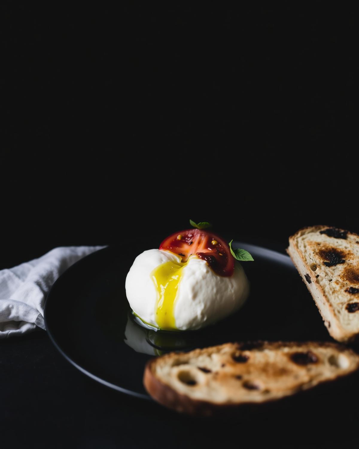 Burrata — Heirloom tomato · basil oil · sourdough